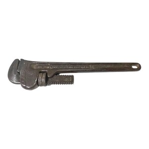 May include: A vintage, black, adjustable pipe wrench with the text "The Ridge Tool Co. Elyria, Ohio, U.S.A. 14" etched into the metal.