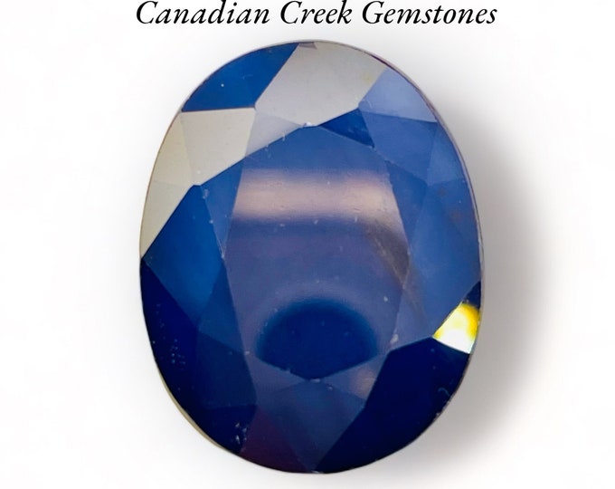 17.93 Carat Spectacular Deep Blue Burma Sapphire. Oval-Cut. 18.0 x 14.1 x 7.8 mm Loose Gemstone for Jewelry Making and Gifts. Earth Mined.