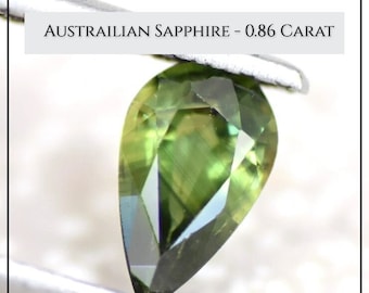 0.86 Carat Bi-Colour Green Sapphire. Australian Premium VVS. Genuine Earth Mined. Jewelry Supplies. Faceted Pear.  8.2 x 4.96 x 3.05 mm.