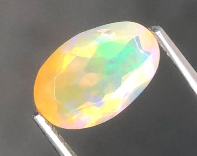 Welo Opal. 1.50 Carats. Oblong Faceted Oval. Genuine Mined. Jewellery Supplies. Gifts. Loose Gemstones. 9.9 x 6.10 x 3.70 mm. Ethiopian.