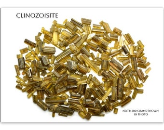 Gemme grezze di clinozoisite da 50 carati. Non trattate. Estratta da vera terra. Vendute in lotti. Stessa famiglia della tanzanite. Grezze, verde oliva.