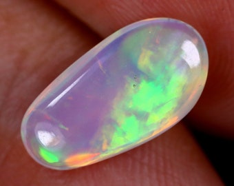 Welo Opal. 1.94 Carats. Oblong Freeform Oval. Genuine Mined. Jewellery Supplies. Gifts. Loose Gemstones. 13.7 x 7.2 x 3.7mm. Ethiopian.