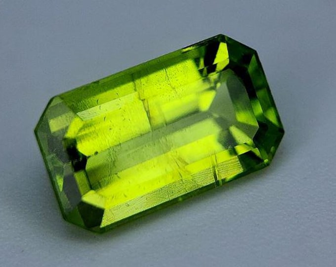 2.33 Genuine Mined Himalayan Peridot Faceted Loose Gemstone for Making Jewellery. Emerald Cut. 10 x 6 x 4 mm. Birthstone. Untreated