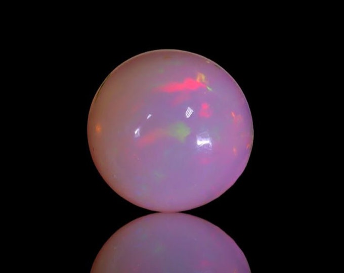 Genuine Mined 0.57 Carat Natural Ethiopian Welo Opal Cabochon. 6.8 x 6.79 x 3.15 mm. Light Colouration. Oval. Loose Gemstone. Birthstone