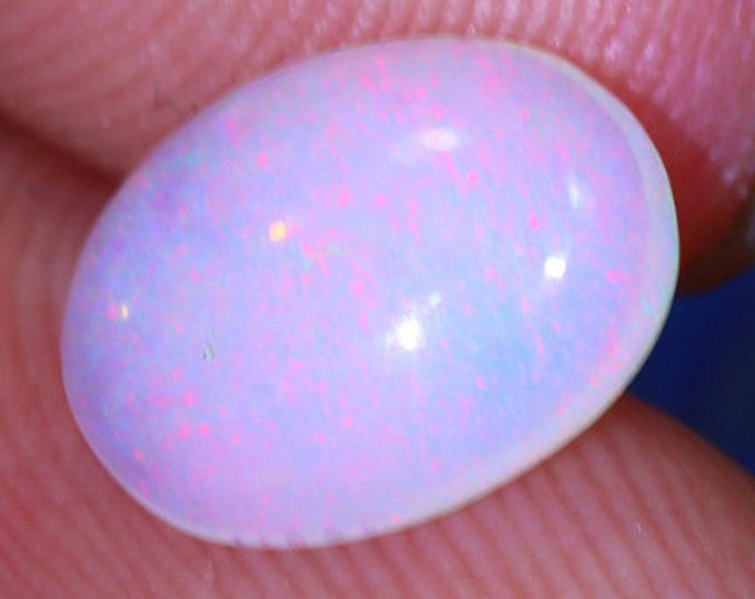 Genuine Mined 2.21 Carat Natural Ethiopian Welo Opal Cabochon. 11.9 x 10.25 x 3.66. Light Colouration. Oval. Loose Gemstone. Birthstone.