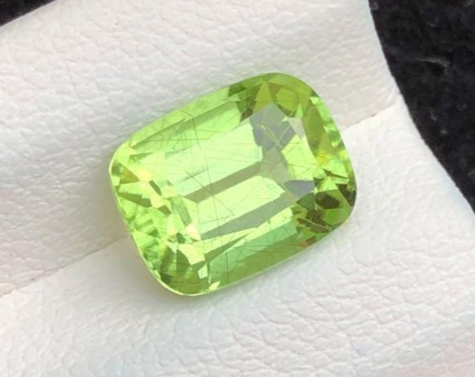 2.95 Carat Genuine Mined Rutile Peridot. Faceted Loose Gemstone for Making Jewellery. Cushion Cut. 9.1 x 6.8 x 5.3 mm. Untreated. VS Grade
