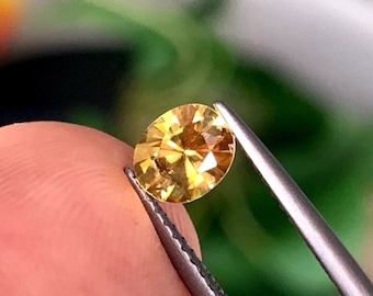 0.67 Carat Natural Sphene Mesmerizing Lustre  5.800 x 5.00 x 3.30mm.  Orange Yellowish Loose Gemstone for Jewelry Making and Gifts.