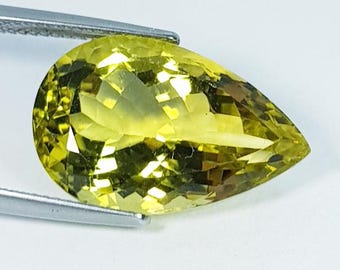 14.83 Carat Earth Mined Lemon Gold Citrine. Faceted Pear Cut. Loose Gemstone for Making Rings. VVS. 21.100 x 13.600 x 9.700 mm