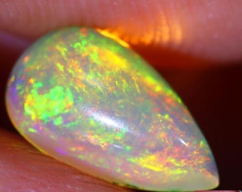 Genuine Mined 0.70 Carat Natural Ethiopian Welo Opal Cabochon. 8.84 x 5.14 x 3.24 mm. Untreated Opal. Oval. Loose Gemstone. Birthstone.