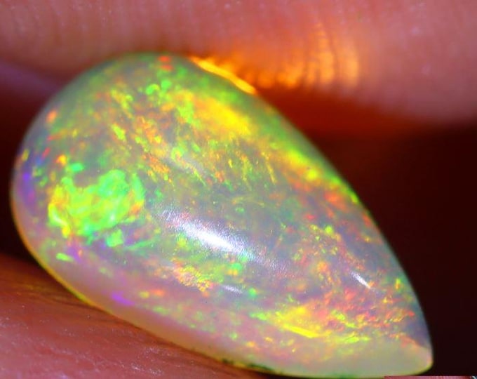 Genuine Mined 0.70 Carat Natural Ethiopian Welo Opal Cabochon. 8.84 x 5.14 x 3.24 mm. Untreated Opal. Oval. Loose Gemstone. Birthstone.
