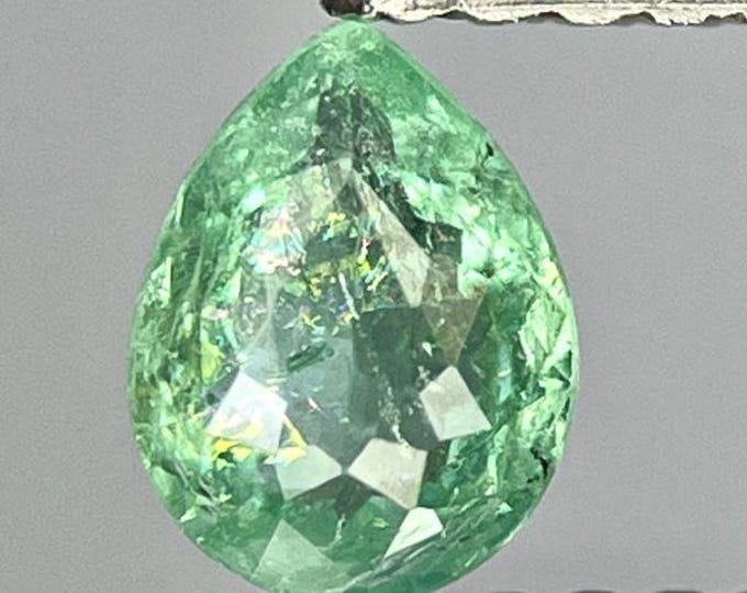 0.41 Carat Paraiba Tourmaline. Faceted Pear Cut. Loose Gemstones for Jewelry. SI. Earth Mined. 5.7 x 4.4 x 2.6 mm. Medium Tone. Mozambique