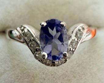 1.70 Gr Natural Violet Blue Iolite 5.6 x 3.9 mm with White Zircon Hallmark 925 Sterling Silver With White Gold Plating. Size 7, TCW 8.50