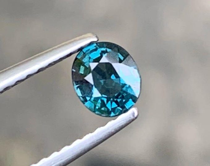 0.43 Carat Natural Spinel. VS. Beautiful Teal Gemstone. Genuine Mined. Faceted Oval Cut. Untreated. 5 x 4.3 x 2.5 mm. Premium Piece.