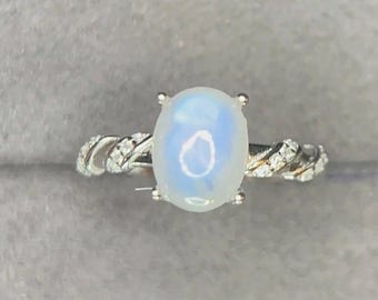 Lovely Natural White Moonstone 8.90 x 7.00 x 3.70 with White Zircon Shoulder Stones, Adjustable Ring. 925 Sterling Silver TCW 10.70 Carats