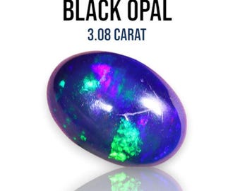 3.08 Carat Genuine Mined Ethiopian Black Opal. Moderate Colour Play. Opal Cabochon. Black Opal for Jewellery. 12.12 x 8.47 x 5.6 mm