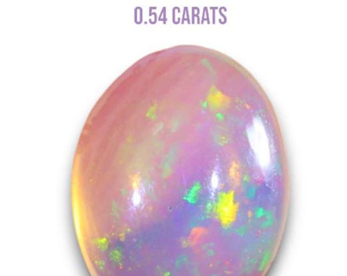 Genuine Mined 0.54 Carat Natural Ethiopian Welo Opal Cabochon. 7.86 x 6.02 x 2.55 mm. Untreated Opal. Oval. Loose Gemstone. Birthstone.