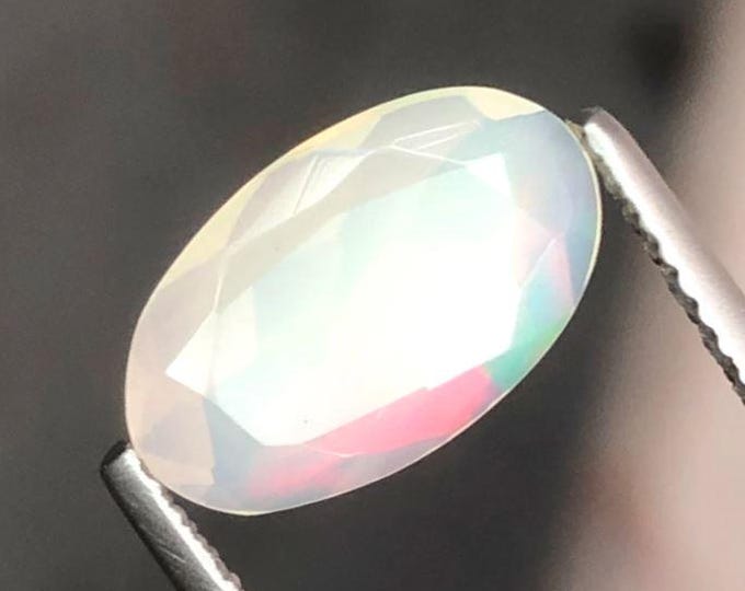 1.40 Carat Natural White Opal. Faceted Oval. 11.8 x 7 x 2.5 mm. Genuine Earth Mined. Untreated. Birthstone Gift. Loose Gemstones.