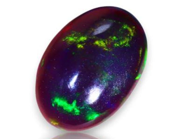 0.55 Carat Genuine Mined Ethiopian Black Opal. Moderate Colour Play. Opal Cabochon. Black Opal for Jewellery. 7 x 5mm. Smoked.