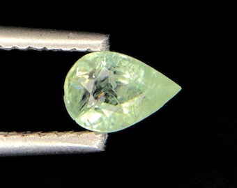 0.53 Carat Paraiba Tourmaline. Faceted Pear Cut. Loose Gemstone for Jewelry. SI. Earth Mined. 6.2 x 4.25 x 3.32 mm. Medium Tone. Mozambique