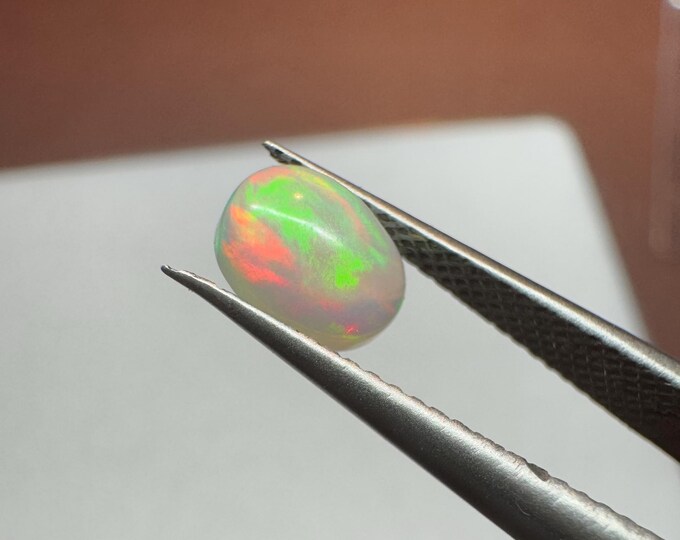 Genuine Mined 0.46 Carat Natural Ethiopian Welo Opal Cabochon. 5.95 x 4.85 x 2.47 mm. Untreated Opal. Oval. Loose Gemstone. Birthstone.