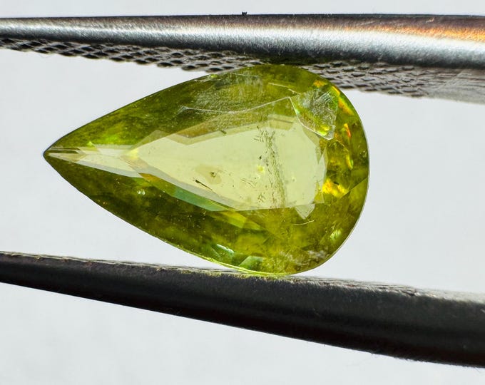 0.75 Carat Genuine Chrome Fire Sphene. Faceted Pearl Cut. Loose Gemstones for Creating Jewellery. 8.8 x 5.6 x 2.5. Titanite. I Grade.