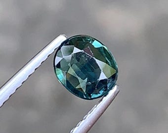 0.74 Ct Natural Teal Sapphire. Cushion Cut. Genuine Mined. Precious Gems for Jewellery. Teal-Colour Sapphire. Heated. 6.1 x 5.3 x 2.4 mm