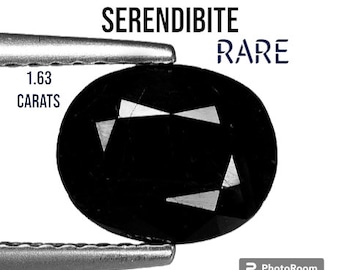 1.64 Ct Extremely Rare Serendibite from Burma. Genuine Earth Mined. Untreated. 8.600 x 7.000 x 3.500 mm. Black Oval Gemstones. Rare Gemstone