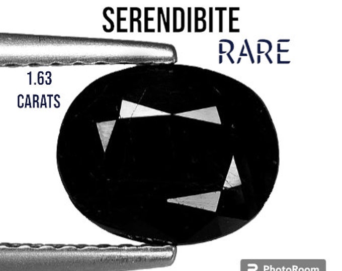 1.64 Ct Extremely Rare Serendibite from Burma. Genuine Earth Mined. Untreated. 8.600 x 7.000 x 3.500 mm. Black Oval Gemstones. Rare Gemstone