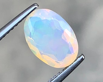 1.15 Carat Natural White Opal. Faceted Oval. 9.5 x 6.7 x 4.6 mm. Genuine Earth Mined. Untreated. Birthstone Gift. Loose Gemstones.