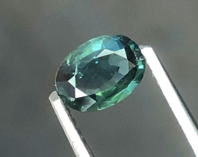 0.70 Ct Natural Teal Sapphire. Oval Cut. Genuine Mined. Precious Gems for Jewellery. Teal-Colour Sapphire. Heated. 5.5 x 3.9 x 1.8 mm