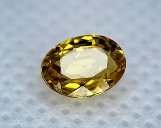 1.45 Crt Authentic Mined Zircon. Gold Yellow. Faceted Oval Loose Gemstones for Making Jewellery. VVS. Heated. 7 x 5 x 3mm. Birthstone.