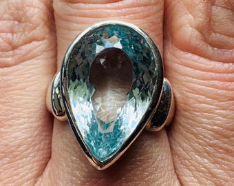 Certified: Genuine Mined 11.16 Carat Sky Blue Topaz in 925 Silver. Thick Bold Band. Size 7 CA/US. Made in Canada. Incredible Luster.