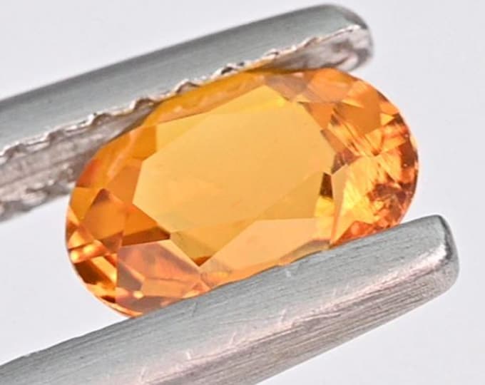 0.82 Cts Natural Rare Clinohumite from Pamir Mountain, Tajikistan. Real Rare Loose Gemstone. 100 % Natural. Orange Stone. 6.7 x 5.2 x 3.6 mm