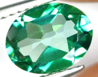 2.36 Bright Green Topaz. VS. Oval Cut. 9.20 x 7.30 x 4.50 mm Loose Gemstone for Jewelry Making and Gifts. Earth Mined. Surface Coated.