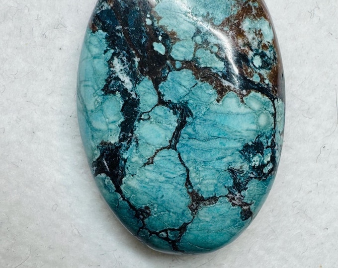 19.15 Carat Magnesite Loose Gemstone. 27.2 x 18mm. Treated. Loose Gemstone for Jewellery. Teal Blue Colour. Oval Cabochon.