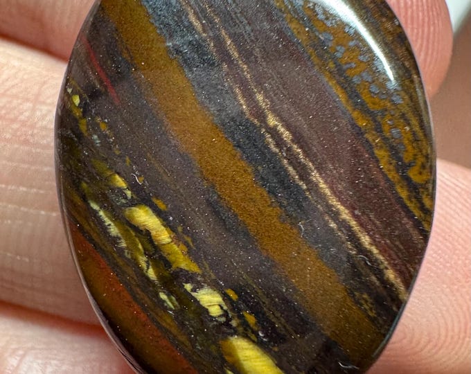 26.65 Carat Iron Tigers Eye Cabochon. Healing Stone. Loose Gemstones for Jewelry. Genuine Mined. Untreated. High Polish. 25.7 x 18.5 mm