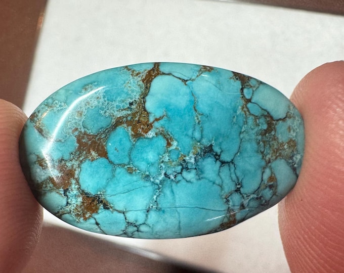 15.90 Carat Magnesite Loose Gemstone. 28.6 x 18mm. Treated. Loose Gemstone for Jewellery. Teal Blue Colour. Oval Cabochon. Treated