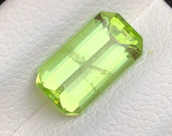 Discounted: 2.40 Carat Genuine Mined Peridot Faceted Loose Gemstone for Making Jewellery. 10.3 x 5.8 x 4mm. Cracked. I Grade. Untreated.