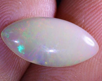 Genuine Mined 1.13 Carat Natural Ethiopian Welo Opal Cabochon. 13.89 x 6.6 x 2.4 mm. Light Colouration. Marquise. Loose Gemstone. Birthstone