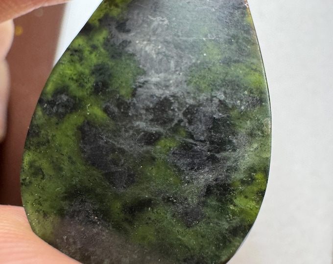 Thin B.C Canadian Jade Gemstone. "Guitar Pick" 12.85 Carat Total. Beautiful Green Pendant Stone. Created in B.C Canada. 33 x 19.6 x 2 mm