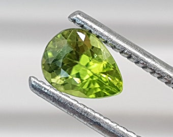 Natural Green Peridot 0.71 Carats Gemstone. SI. Pear-shaped 7 x 4.8 x 3mm. Untreated. Medium Green. Earth Mined. Loose Gemstones.