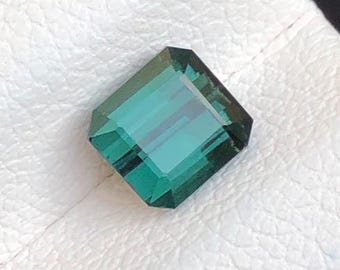 0.95 Carat Teal Tourmaline Gemstone from Afghanistan. Faceted Emerald Cut. Loose Gemstones for Jewelry. VS. Natural Untreated. 5 x 5 x 4 mm.