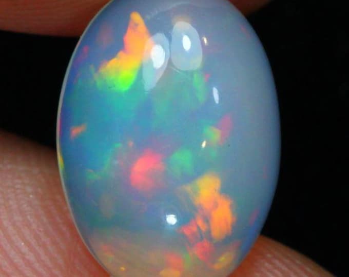 Genuine Mined 3.11 Carat Natural Ethiopian Welo Opal Cabochon. 14.1 x 9.8 x 5.5 mm. Beautiful Colouration. Oval. Loose Gemstone. Birthstone