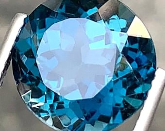 8.26 Carat London Blue Topaz. Round Cut. 11.5 x 11.5 x 8.5 mm. Loose Gemstone for Jewelry Making and Gifts. Earth Mined. Irradiated. VS.