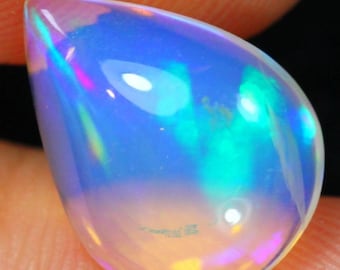 1.24 Carats Smoked Black Green Flash Ethiopian Opal Faceted Oval Shaped 11.00 x 6.70 x 3.700 mm Loose Gemstone for Jewelry Making and Gifts.