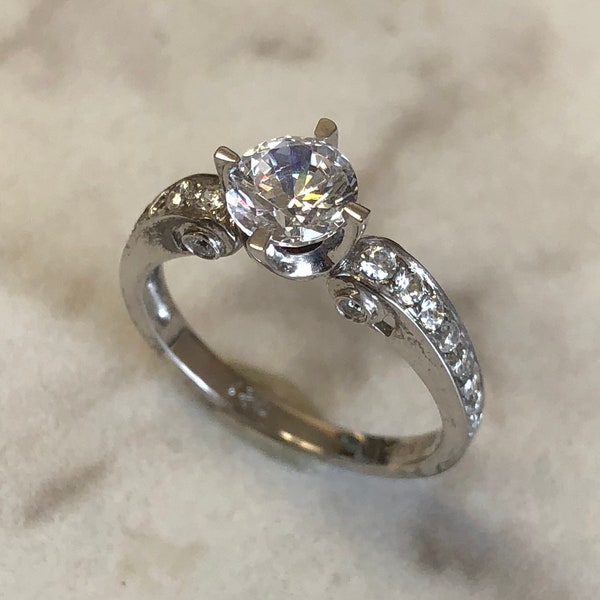 Sterling Silver Lady's CZ Engagement Ring with the look of 1 1/3ct total weight at a Fraction of the Cost.