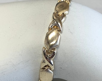 7&quot;....14kt Yellow Gold Lady&#39;s &quot;HUGS AND KISSES&quot; Bracelet 7&quot; in Length at a Very Affordable Price.