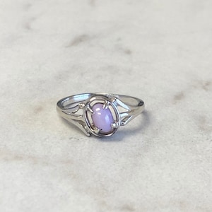 Pink Star Sapphire...10kt White Gold Lady&#39;s Genuine Pink Star Sapphire Oval Cabochon Gemstone Fashion Ring at a Very Affordable Price.