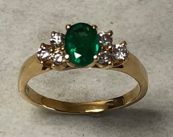Emeralds...14kt Yellow Gold Lady's Diamond and Emerald Ring at an Incredible Price.