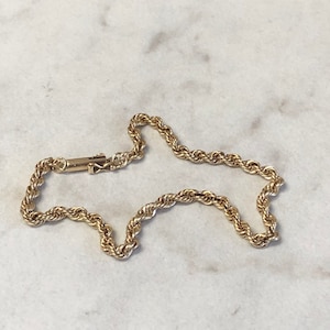 8&quot;....14kt Yellow Gold Men&#39;s 3mm Solid Rope Bracelet in 8&quot; Length.
